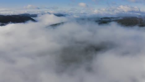 dense white cloud cover above the summer tundra valley