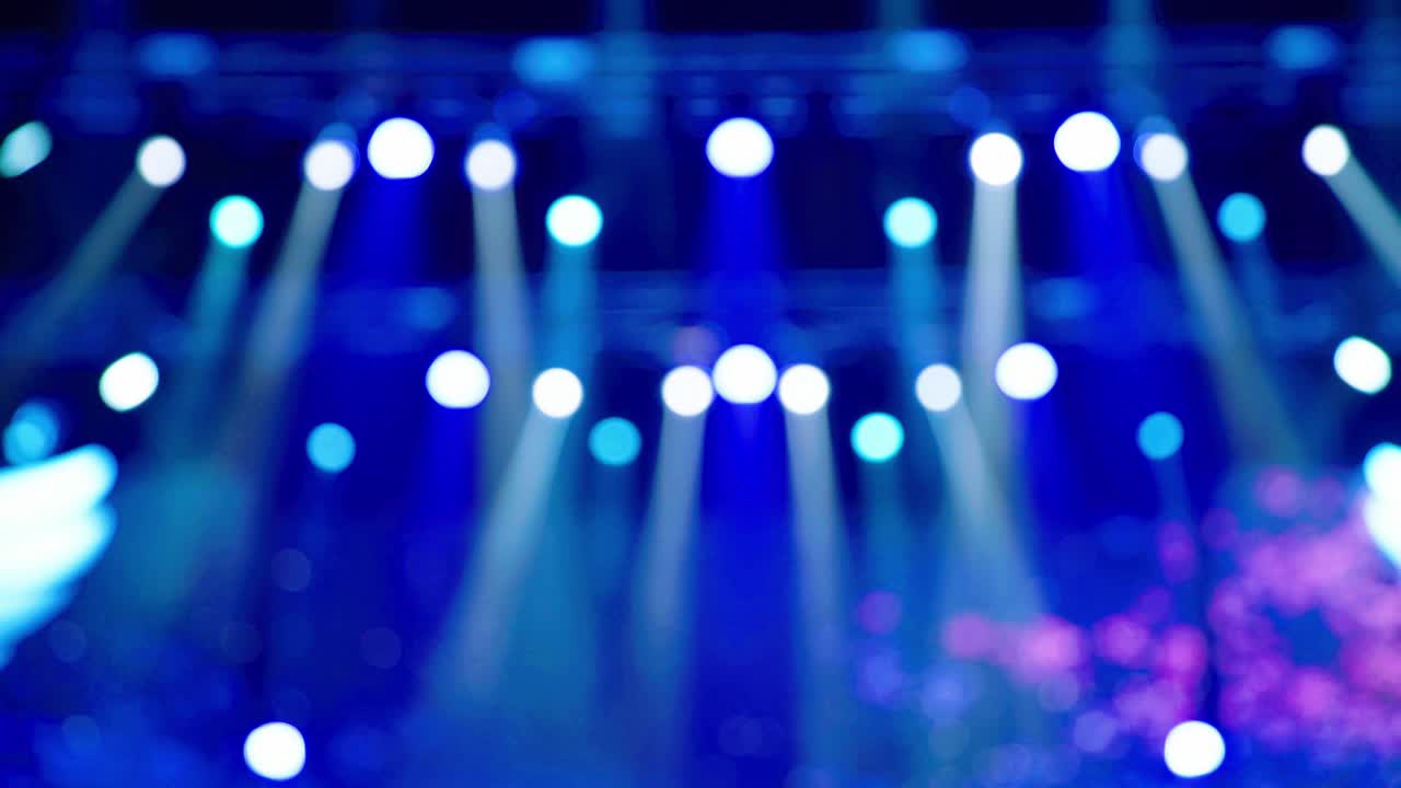 The lights on the stage are lit