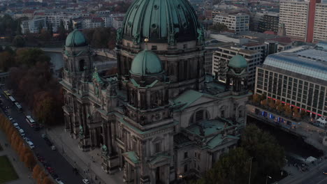 Tilt-down-footage-of-Berlin-Cathedral-details.-Richly-decorated-one-of-turrets-in-corner-of-church.-Berlin,-Germany.