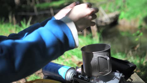 Cooking-instant-soup-in-the-Nature,-Outdoor,-Camping