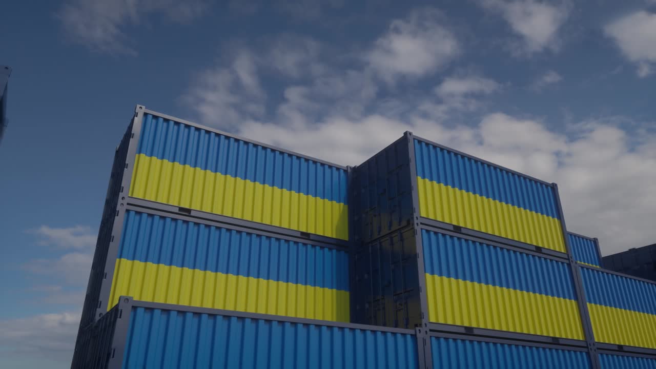 Ukraine flag containers are located at the container terminal. Ukrainian export or import concept