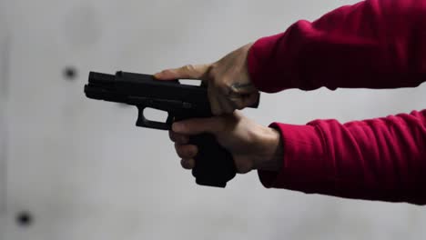 person practicing with a handgun