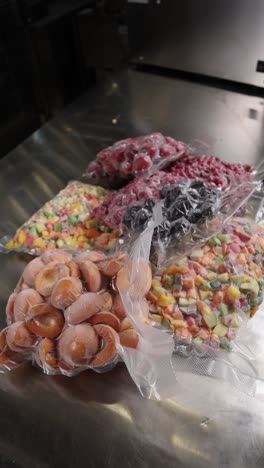 frozen fruits and vegetables in vacuum-sealed bags