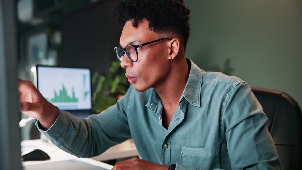 Businessman Celebrating Success Late at Night