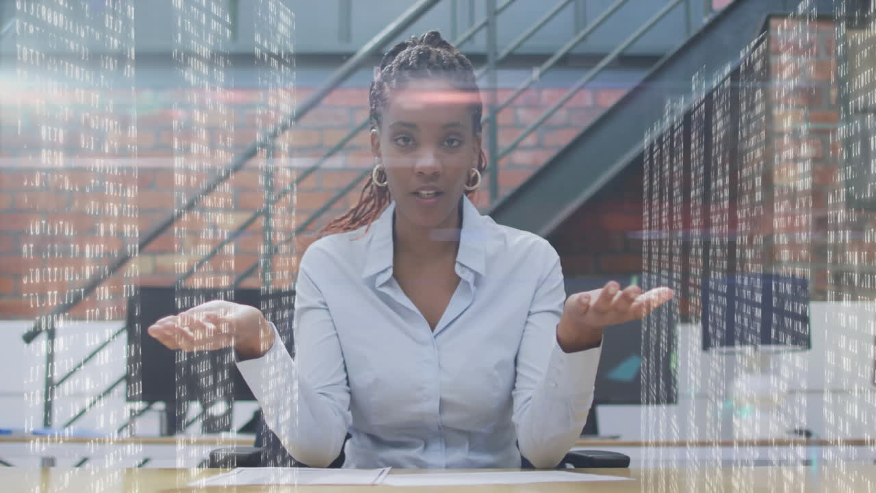 Woman presenting digital data over modern office desk, showing floating binary code graphics