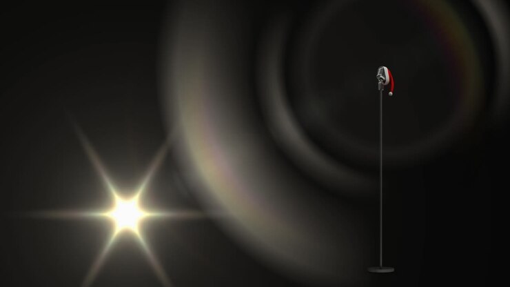 Animation of light and vintage microphone in santa hat on black background
