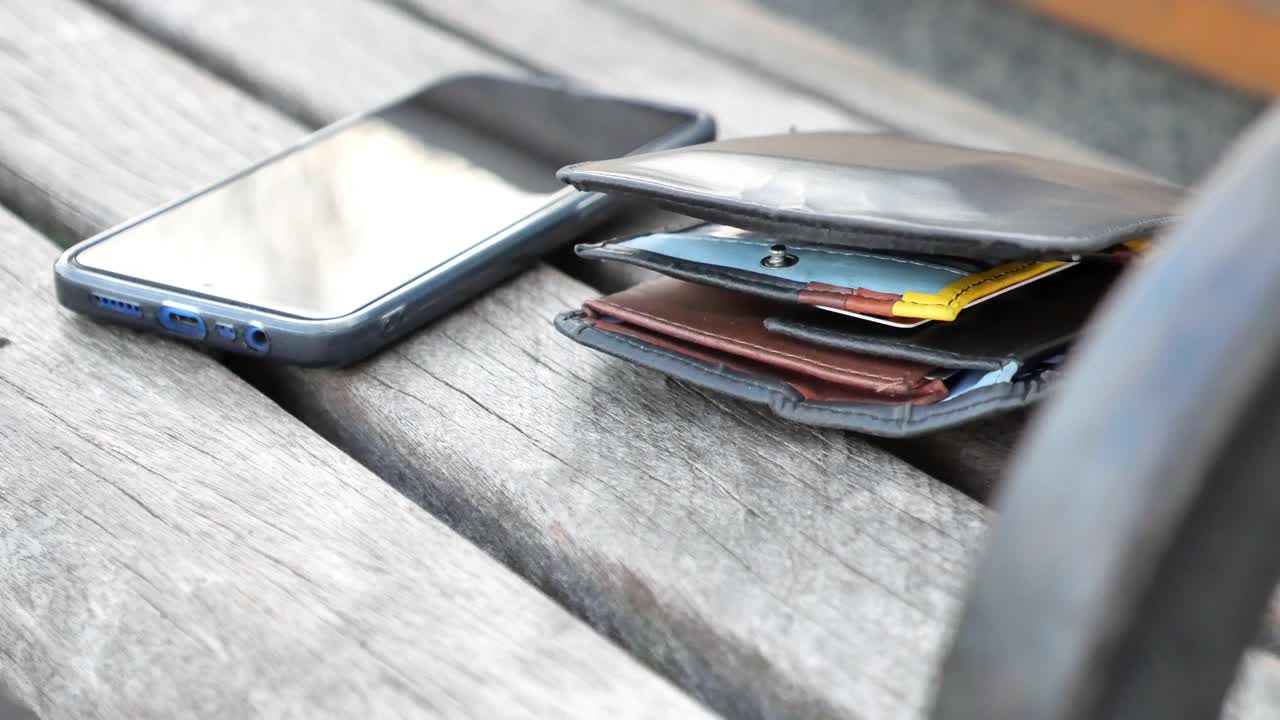 Lost Wallet and Phone on Park Bench