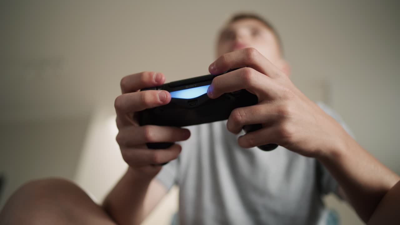 Teenager Playing Video Game