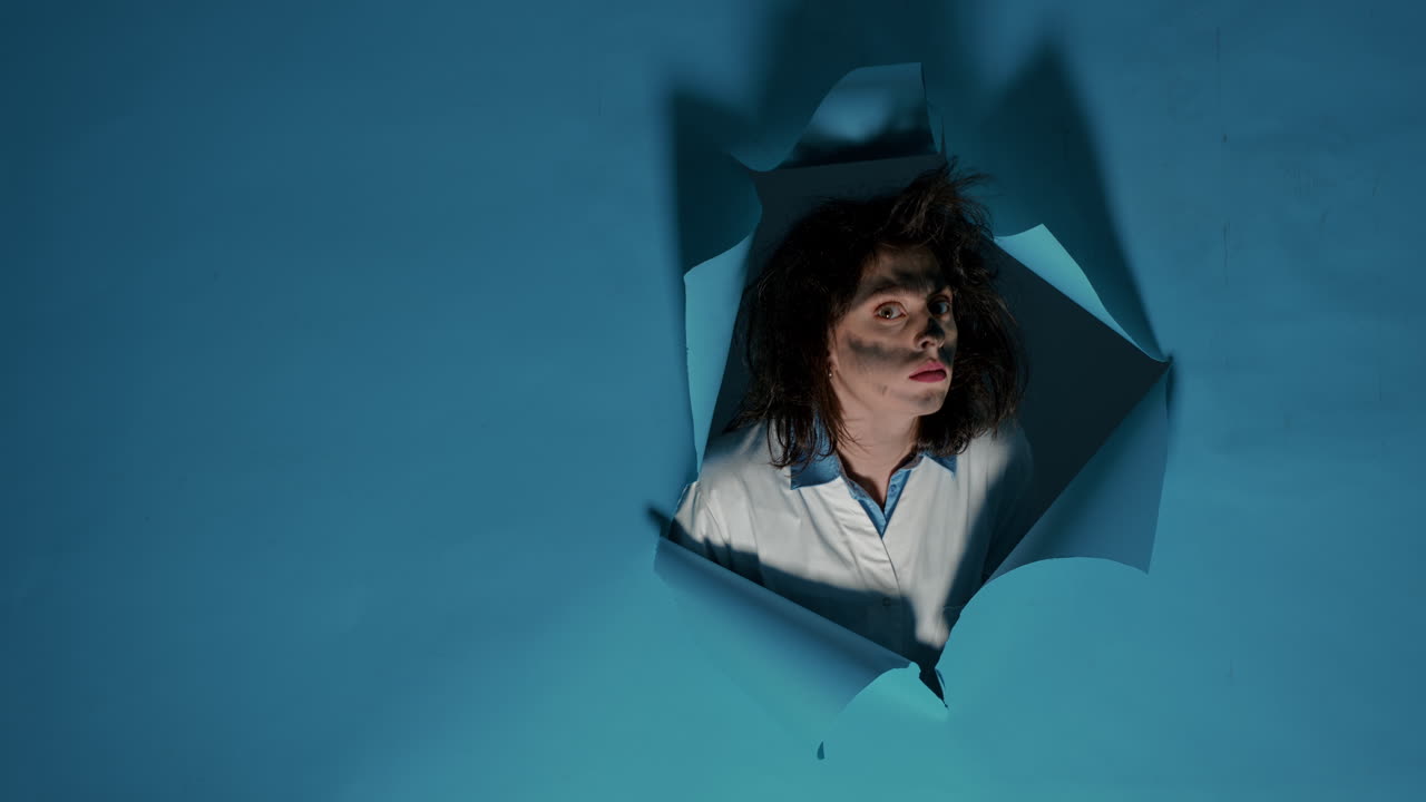 Portrait of crazy female scientist with serious amusing grimace