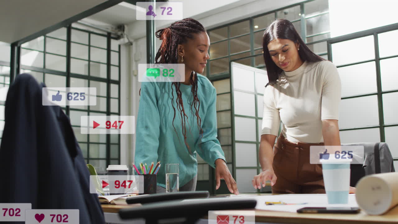 Animation of changing numbers and icons in notification bars, female coworkers sharing ideas