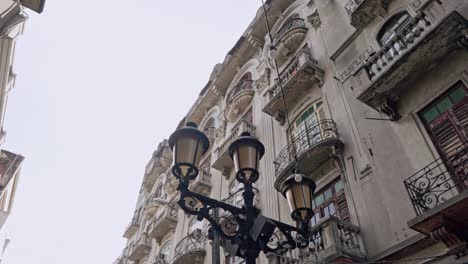 Street-Lamps-Outside-An-Old-Residential-Building-In-Zona-Colonial,-Santo-Domingo,-Dominican-Republic