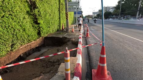 sequence showing road excavation and traffic cones