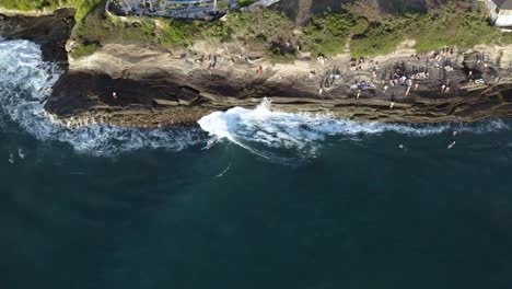 Observing-a-surfer,-surfing-along-China-Walls