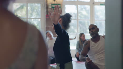 yoga class practicing meditation