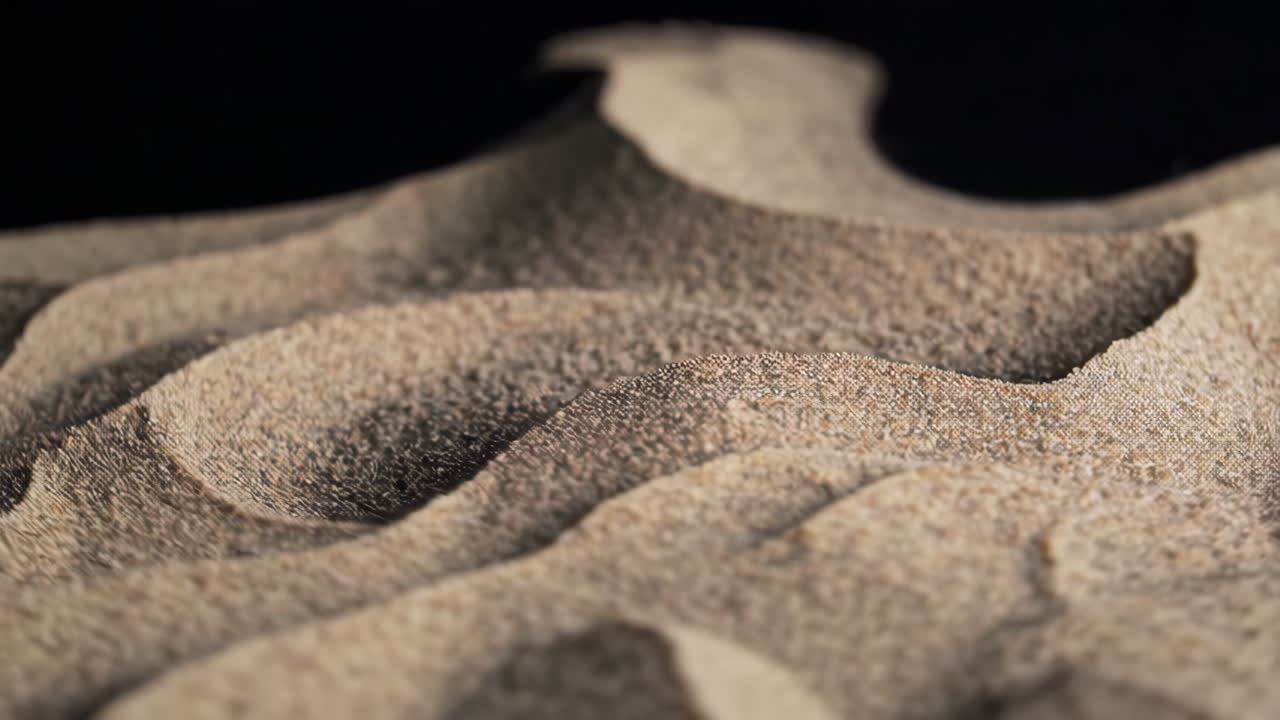 Abstract Close-Up of Textured Wavy Sand-like Surface