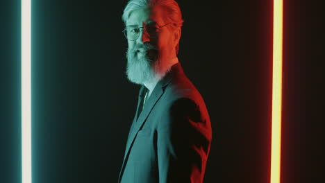 Stylish Senior Businessman in Neon Light