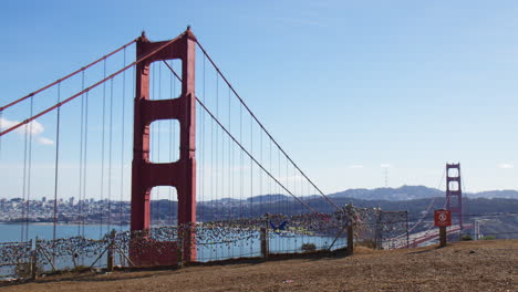 love locks - representation of enduring love between couples - golden gate bridge, san francisco, california - wide shot