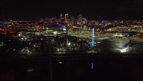 aerial view of tilting shot of downtown denver at night