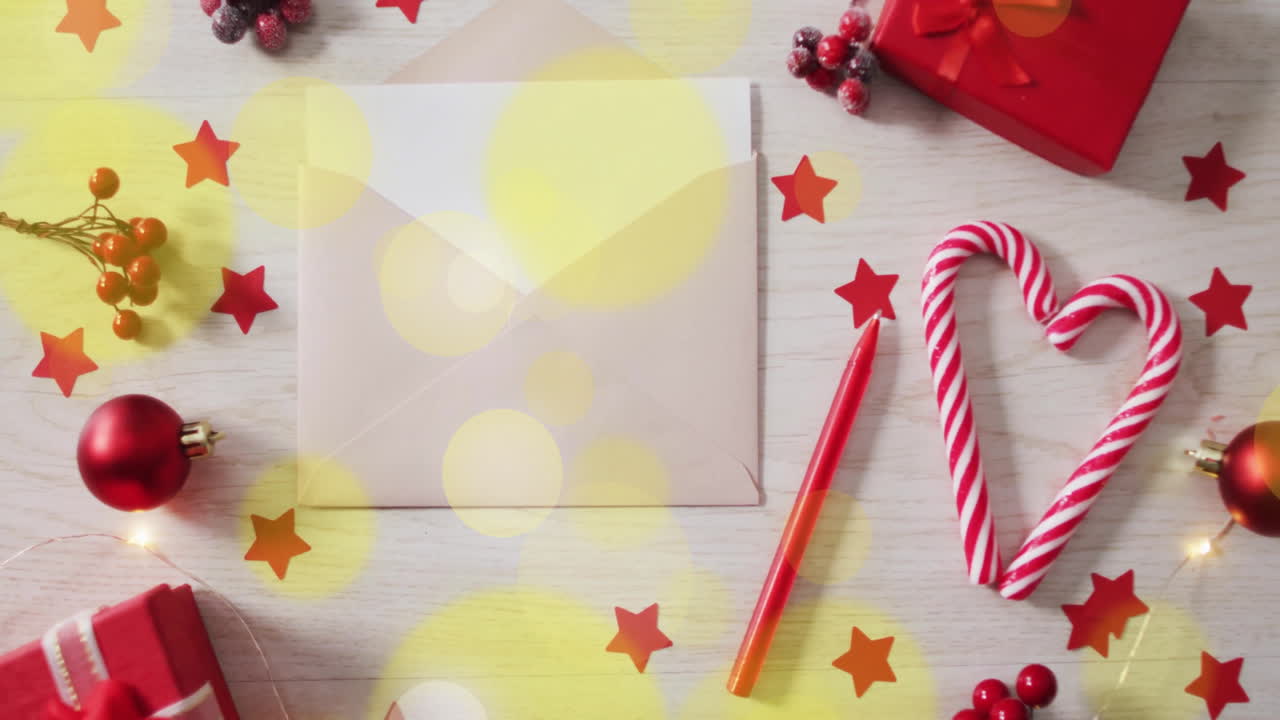Christmas decorations with candy cane and envelope over festive stars animation