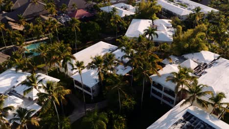 dynamic aerial drone shot of a approaching retreat building