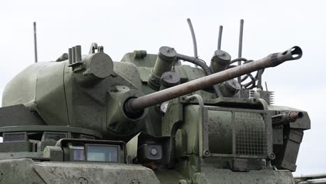 a close-up reveals the lethal weapon system of a russian bmd-4m ifv. the 30mm autocannon, paired with advanced optics, gives it significant firepower in the ukraine conflict