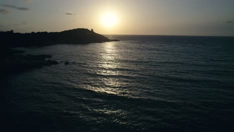 Sunset-over-calm-sea-by-Mallorcan-coast,-Spain