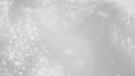 snowflakes falling against white background