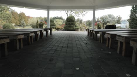 walking down the isle of the amazing gazebo wedding ceremony location a the beautiful orchard view wedding and event center in ottawa, canada