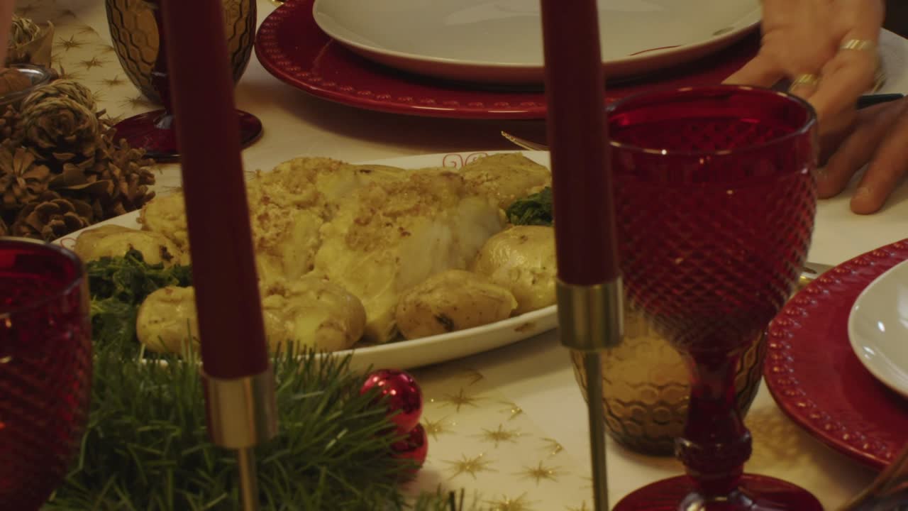 Traditional Portuguese codfish dish elegantly served at a candlelit dinner table