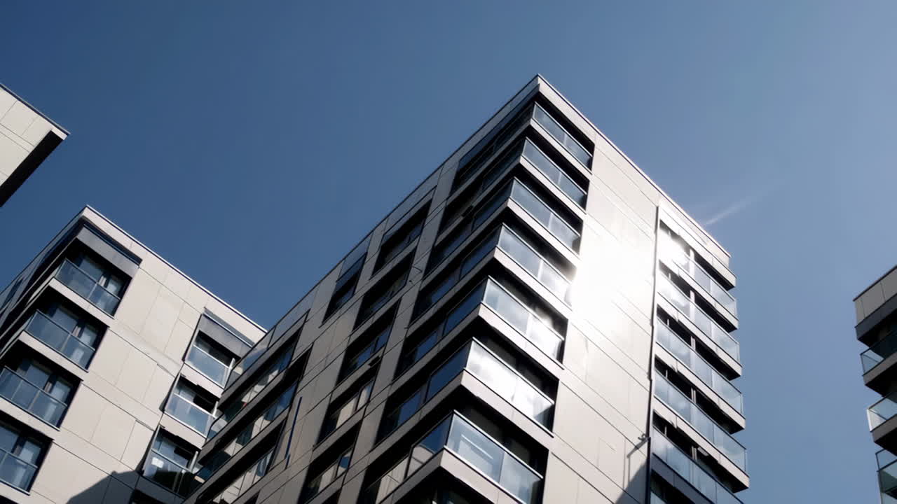 Modern Apartment Buildings Against a Blue Sky