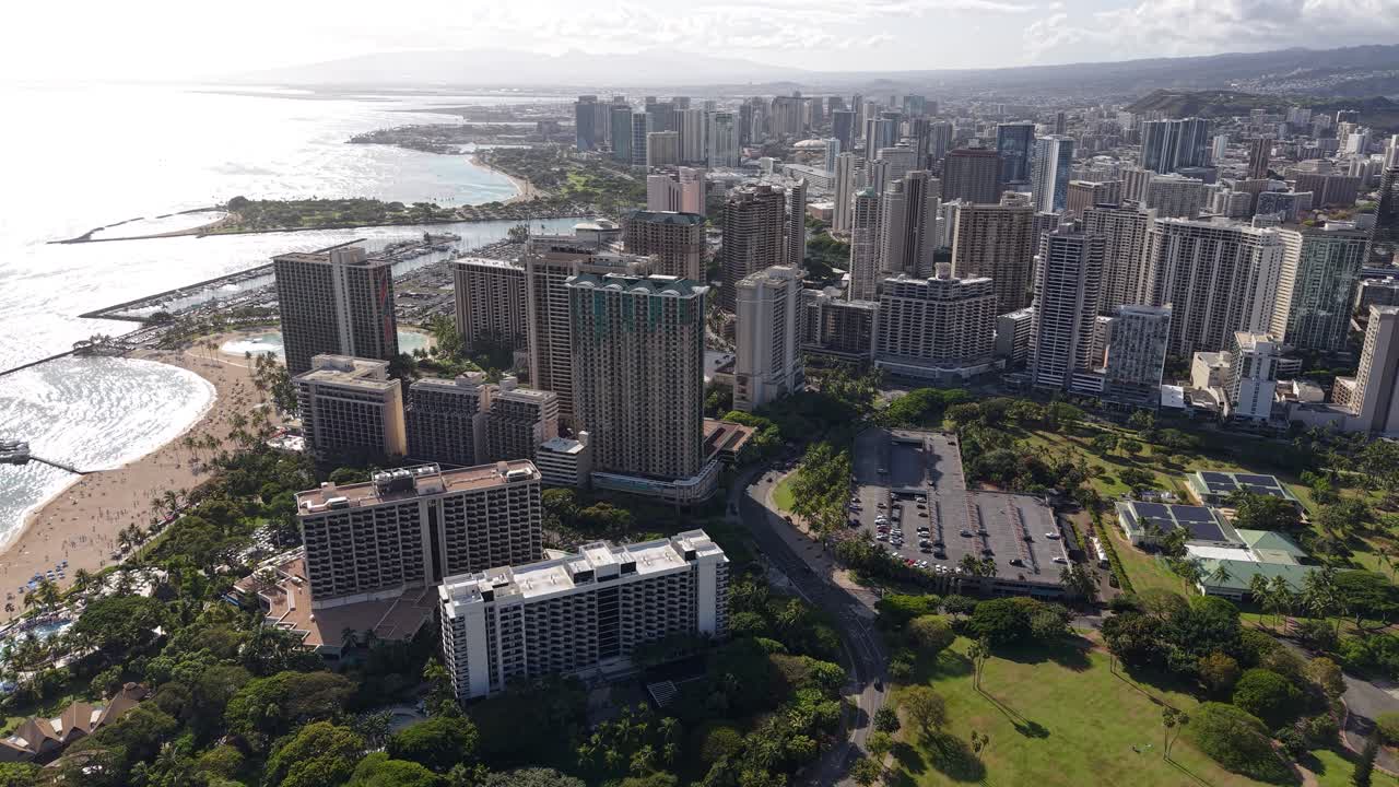 Aerial View of Honolulu Cityscape Skyline, Hawaii USA, Beachfront Buildings and Mist Over City