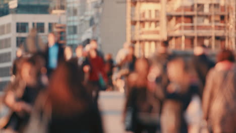 anonymous crowd of people walking  commuters london city street slow motion