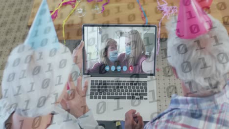 Animation of binary coding numbers over senior couple using laptop on video call