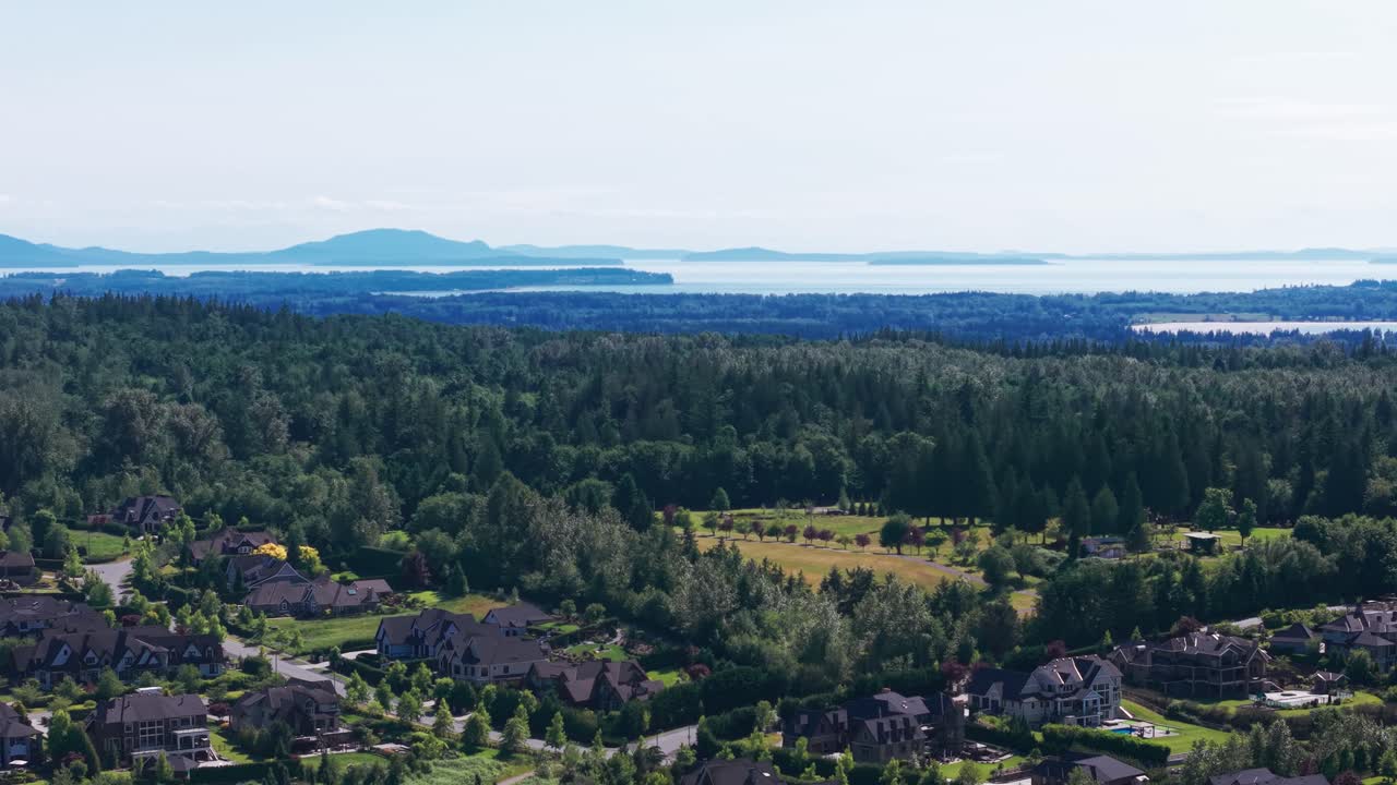 lush green trees with scenic views of the mountains in a luxury suburban neighborhood in Langley Township, British Columbia, Canada
