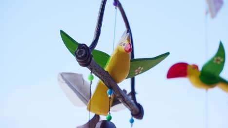 colorful wooden bird wind chime