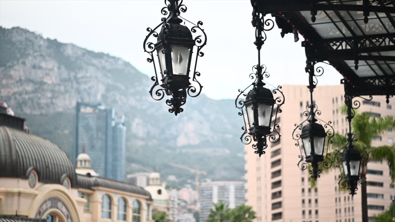 Casino of Monte Carlo building with big metallic lanterns in Monaco, close up view