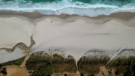 4K-Aerial-Drone-Video-Panning-up-to-reveal-Shelley-Beach,-the-vast-blue-ocean-and-white-sand-next-to-the-campground-in-West-Cape-Howe,-Albany,-Western-Australia