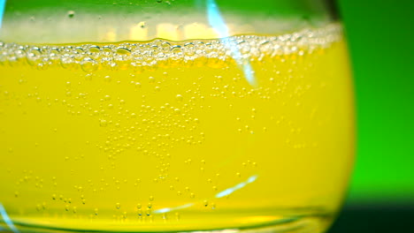 close-up of a yellow fizzy drink