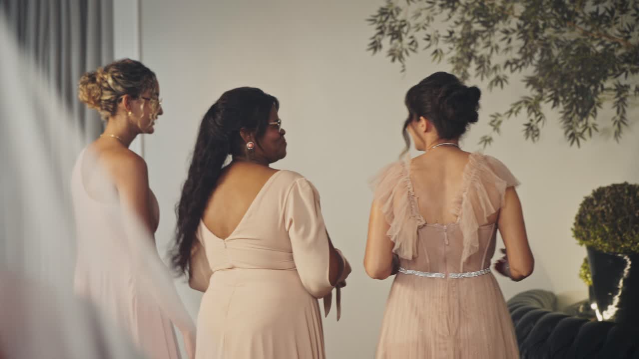 Bridal party celebrating and supporting the bride on her wedding day