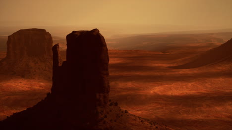 un impresionante paisaje desértico con formaciones rocosas rojas