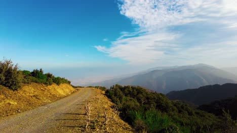 colorful sunbeam at dawn on a path at the top of the algerian atlas mountains