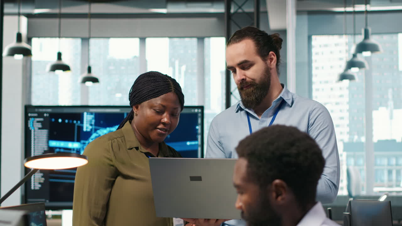 Teamworking Programmers In Office Reviewing Ai System Metrics