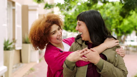 portrait of two happy female friends meeting