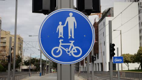 blue sign for shared pedestrian and cycle path