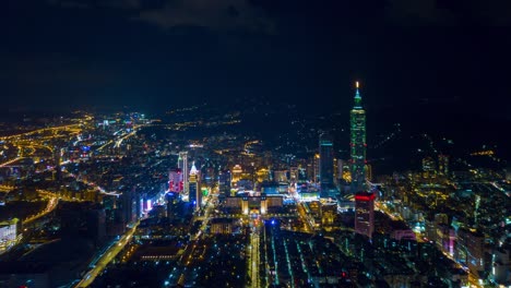 la noche iluminada paisaje de la ciudad de taipei famosa torre panorama aéreo 4k timelapse taiwán