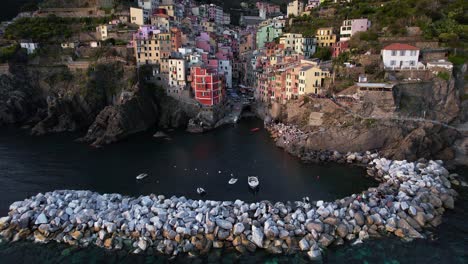 charming village of riomaggiore nestled on terraced hillside