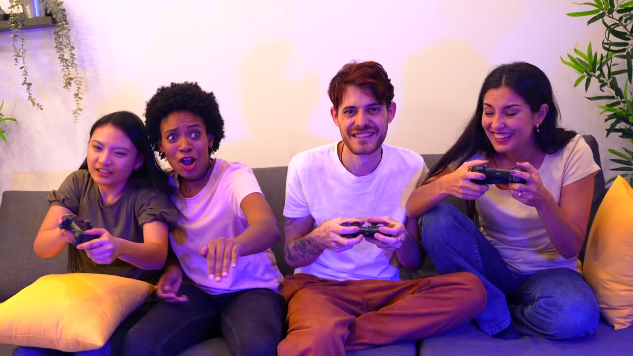 People playing video games on the couch