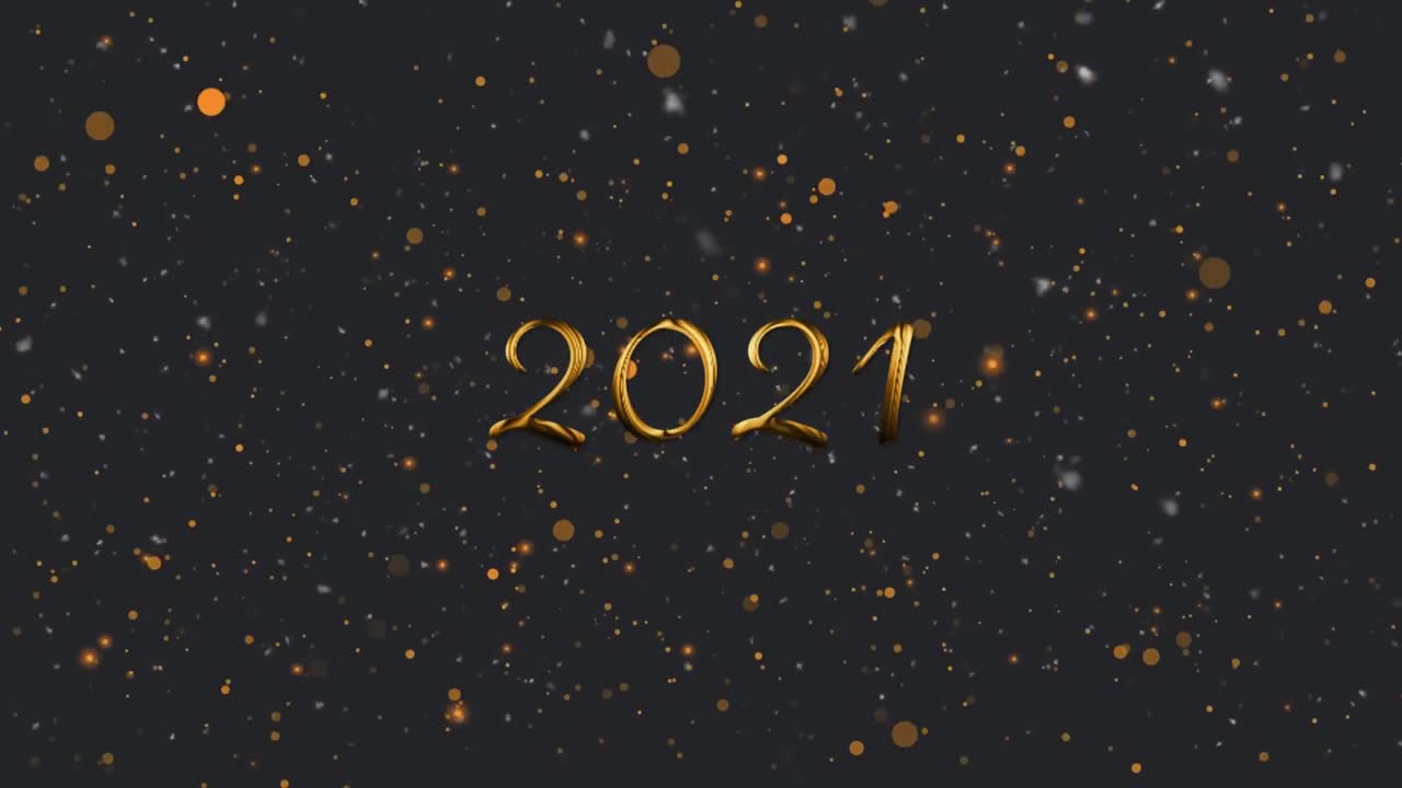 animación del texto dorado 2021, con manchas de luz naranja flotando sobre un fondo negro