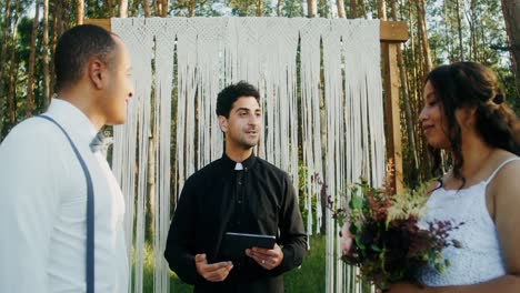 outdoor wedding ceremony in the forest