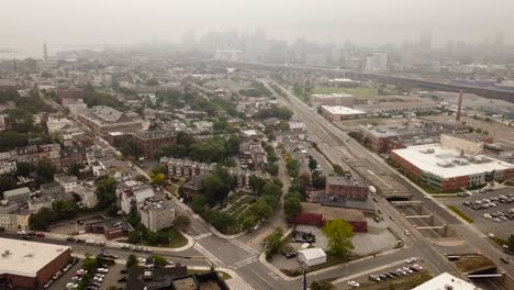 Aerial-Overhead-View-Of-Cars-Driving-On-The-Road-In-The-City-Of-Charlestown-In-Boston,-Massachusetts,-USA